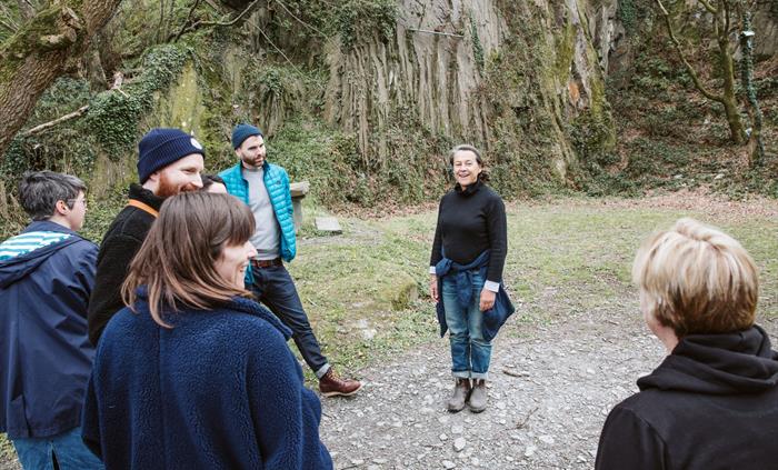 Group of people near a forest